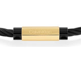 Ανδρικό βραχιόλι Calvin Klein 35000420 κατασκευασμένο από ατσάλι σε μαύρο χρώμα με στριφτό σχέδιο, διακοσμημένο με χρυσό στοιχείο. 