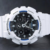 Καταδυτικό ρολόι χρονογράφος Casio G-Shock GA-100B-7AER με λευκό καουτσούκ λουράκι, μαύρο καντράν με μπλε λεπτομέρειες και στεγανότητα 20ATM-200Μ.