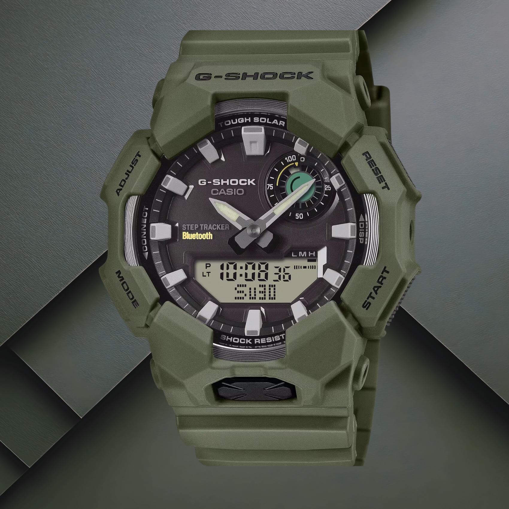 Ανδρικό ρολόι Casio G-Shock GA-B010-3AER με χακί καουτσούκ λουράκι και μαύρο καντράν.