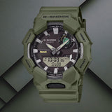Ανδρικό ρολόι Casio G-Shock GA-B010-3AER με χακί καουτσούκ λουράκι και μαύρο καντράν.