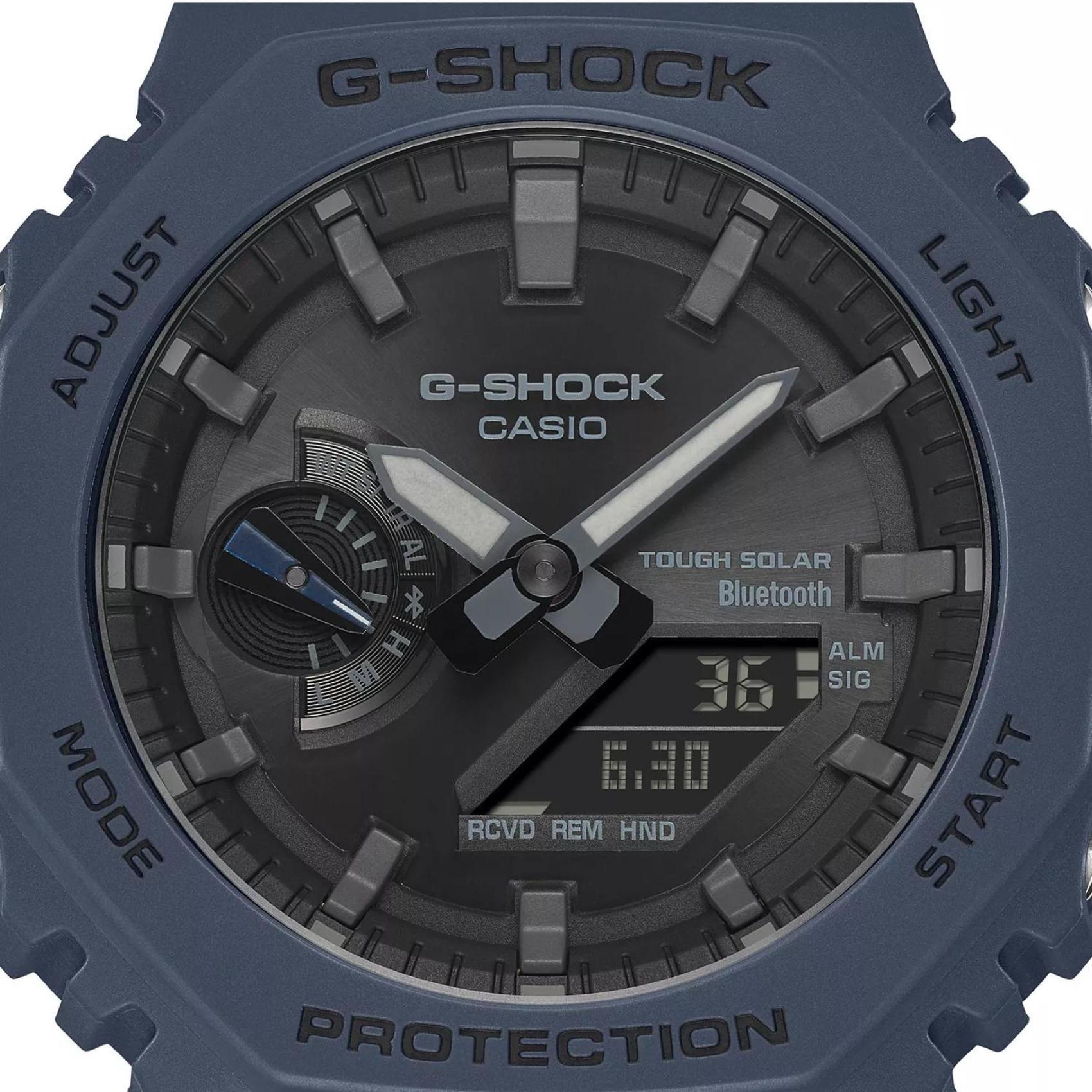 Ρολόι Casio G-Shock GA-B2100-2AER Solar με μπλε καουτσούκ λουράκι και μαύρο καντράν διαμέτρου 48,5mm σε οκτάγωνο σχημα.