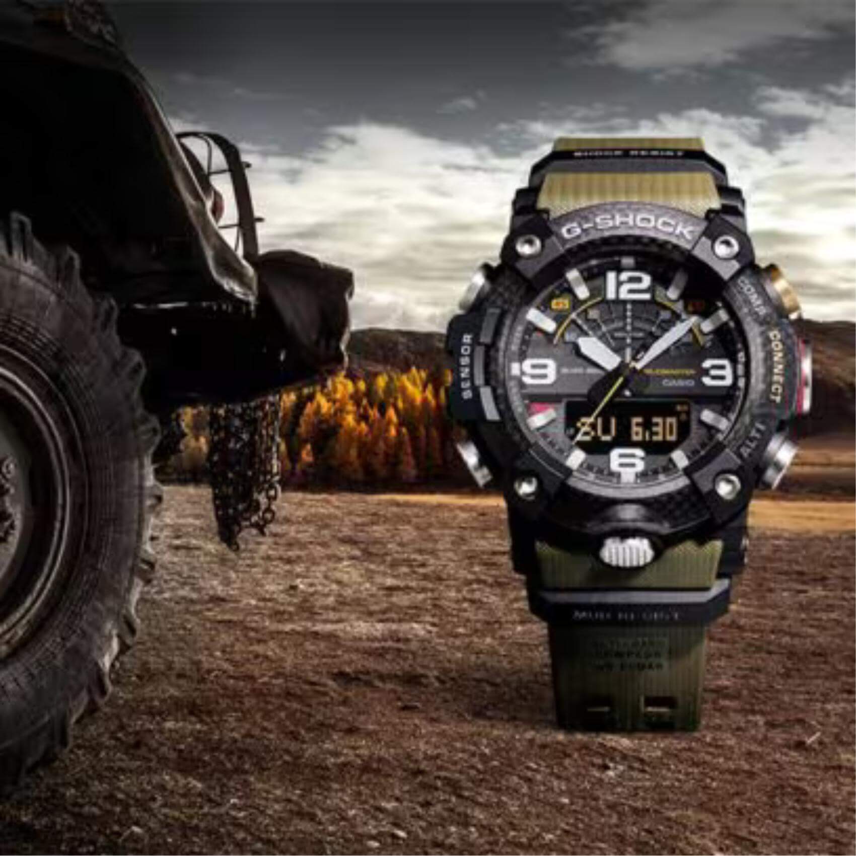 Πλάγια όψη από το ανδρικό ρολόι Casio G-SHOCK GG-B100-1A3ER με χακί καουτσούκ λουράκι.