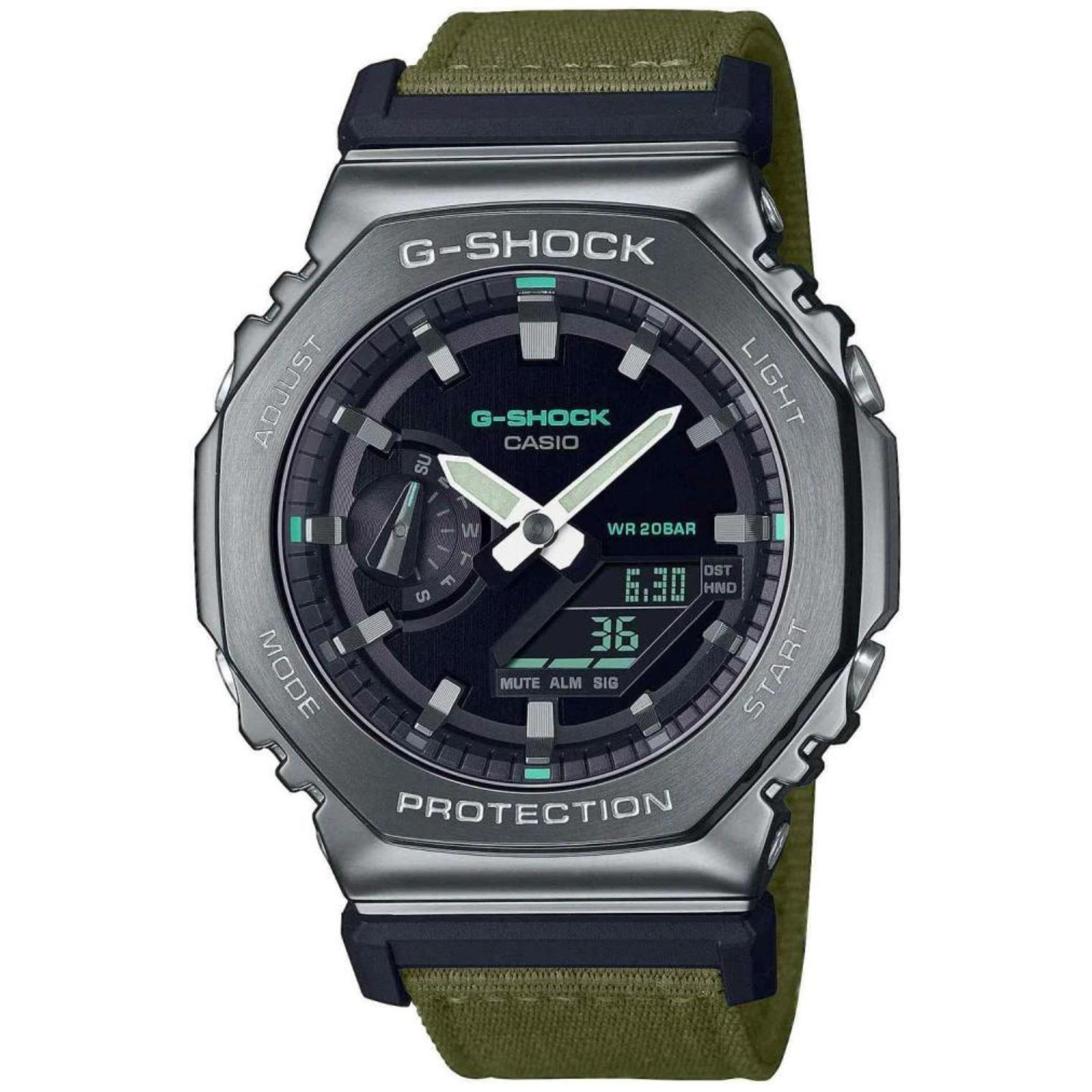 Ρολόι χρονογράφος Casio G-Shock GM-2100CB-3AER με χακί υφασμάτινο λουράκι, μαύρο καντράν μεγέθους 44.4mm anadigi κατάλληλο για καταδύσεις.