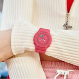 Ψηφιακό/ Αναλογικό ρολόι Casio G-Shock GMA-P2100-4AER με ροζ λουράκι από καουτσούκ και οκτάγωνο ροζ καντράν 45,4mm με ημερομηνία-φορεμενο. 