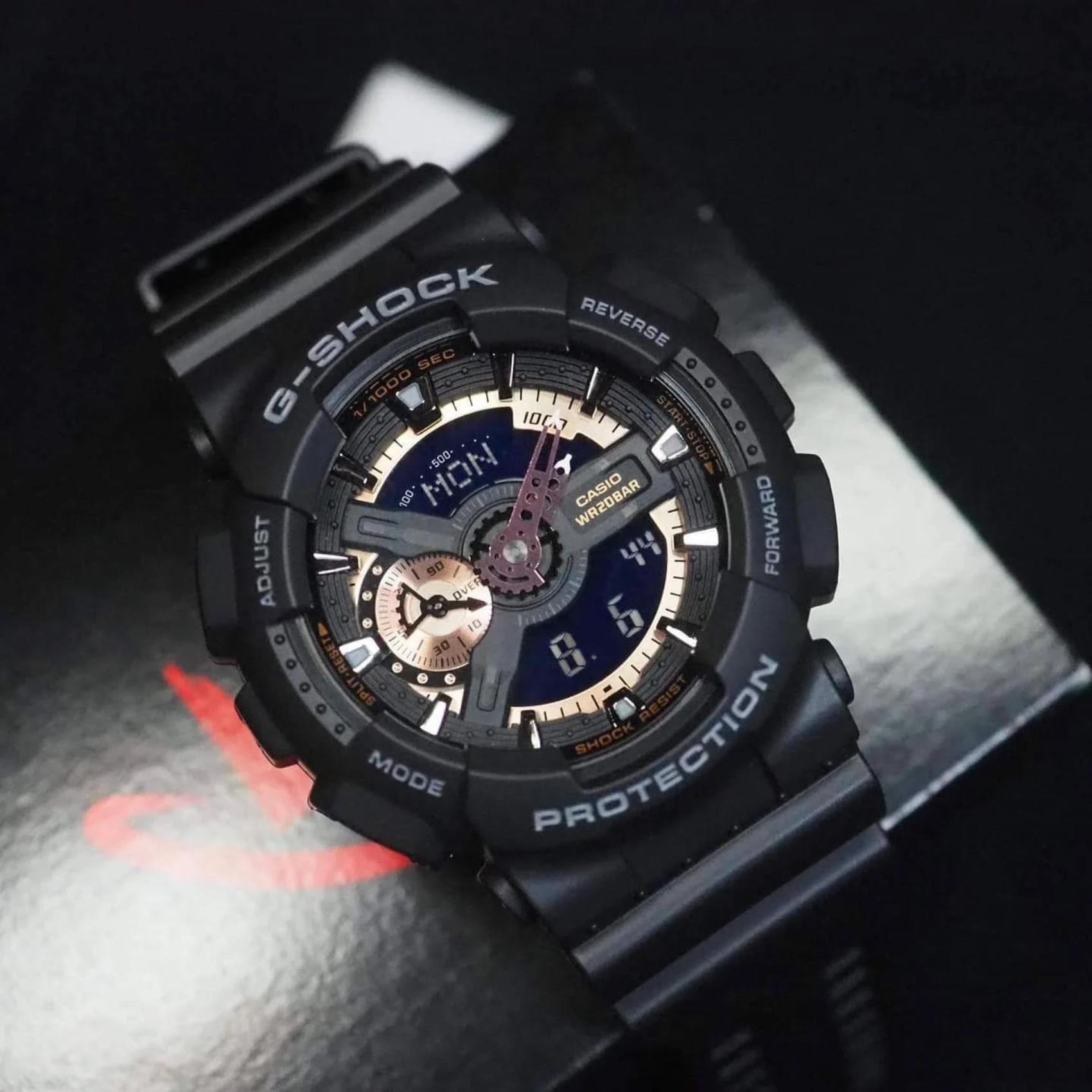 Καταδυτικό ρολόι χρονογράφος Casio G-Shock GA-110RG-1AER με μαύρο καουτσούκ λουράκ, μαύρο καντράν και στεγανότητα 20ATM-200Μ.