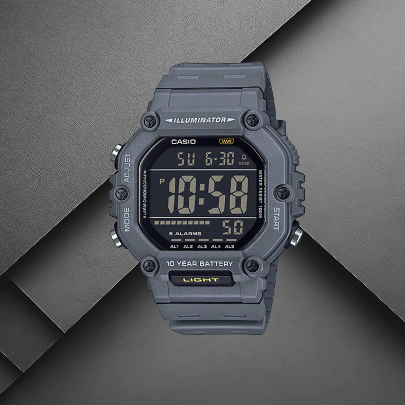 Ανδρικό ρολόι Casio Standard AE-1600H-8BVEF με μαύρο καουτσούκ λουράκι και γκρι ψηφιακό καντράν σε background.