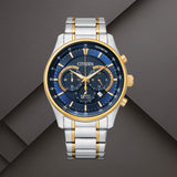 Citizen AN8194-51L ανδρικό ρολόι χρονογράφος με δίχρωμο ασημί-χρυσό μπρασελέ, μπλε καντράν 42mm και ένδειξη ημερομηνίας.
