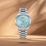 Γυναικείο αυτόματο ρολόι Citizen Tsuyosa NJ0200-50L με γαλάζιο καντράν 37mm, ένδειξη ημερομηνίας και ασημί μπρασελέ.