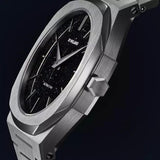 Ρολόι D1 Milano Ultra Thin D1-UTBJ29 με ασημί μπρασελέ, μαύρο καντράν και ασημένια κάσα διαμέτρου 40mm σε οκτάγωνο σχήμα.