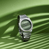 Ρολόι D1 Milano Ultra Thin D1-UTBJ06 Moss με ασημί ατσάλινο μπρασελέ, πράσινο καντράν και οκτάγωνο στεφάνι με διάμετρο στα 40mm αδιάβροχο στις 5ΑΤΜ-50Μ.