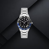 Daniel Wellington DW00100921 ανδρικό ρολόι με ασημί ατσάλινο μπρασελέ, μαύρο καντράν διαμέτρου 40mm, γκρι λεπτομέρειες και μαύρη-μπλε κεραμική στεφάνη.