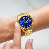 Γυναικείο ρολόι Festina Alegria F20640/5 με χρυσό ατσάλινο μπρασελέ, μπλε καντραν, μηχανισμό μπαταρίας στρογγυλό στεφάνι με διάμετρο 37mm, αδιάβροχο στις 5ΑΤΜ-50Μ.