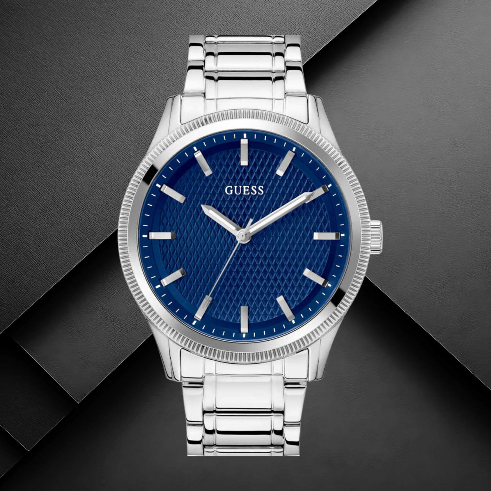 Guess GW0626G1 ανδρικό ρολόι με ασημί ατσάλινο μπρασελέ, μπλε καντράν διαμέτρου 44mm και ασημί λεπτομέρειες.