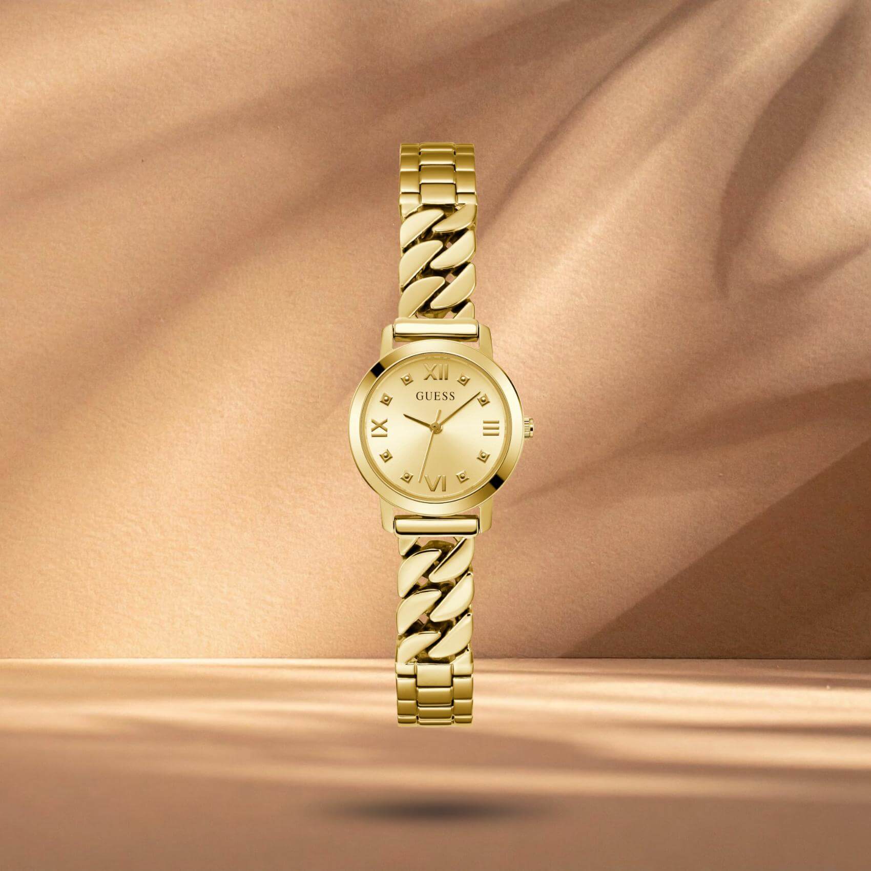 Guess GW0867L2 γυναικείο ρολόι με χρυσό ατσάλινο μπρασελέ και χρυσό καντράν διαμέτρου 25mm.
