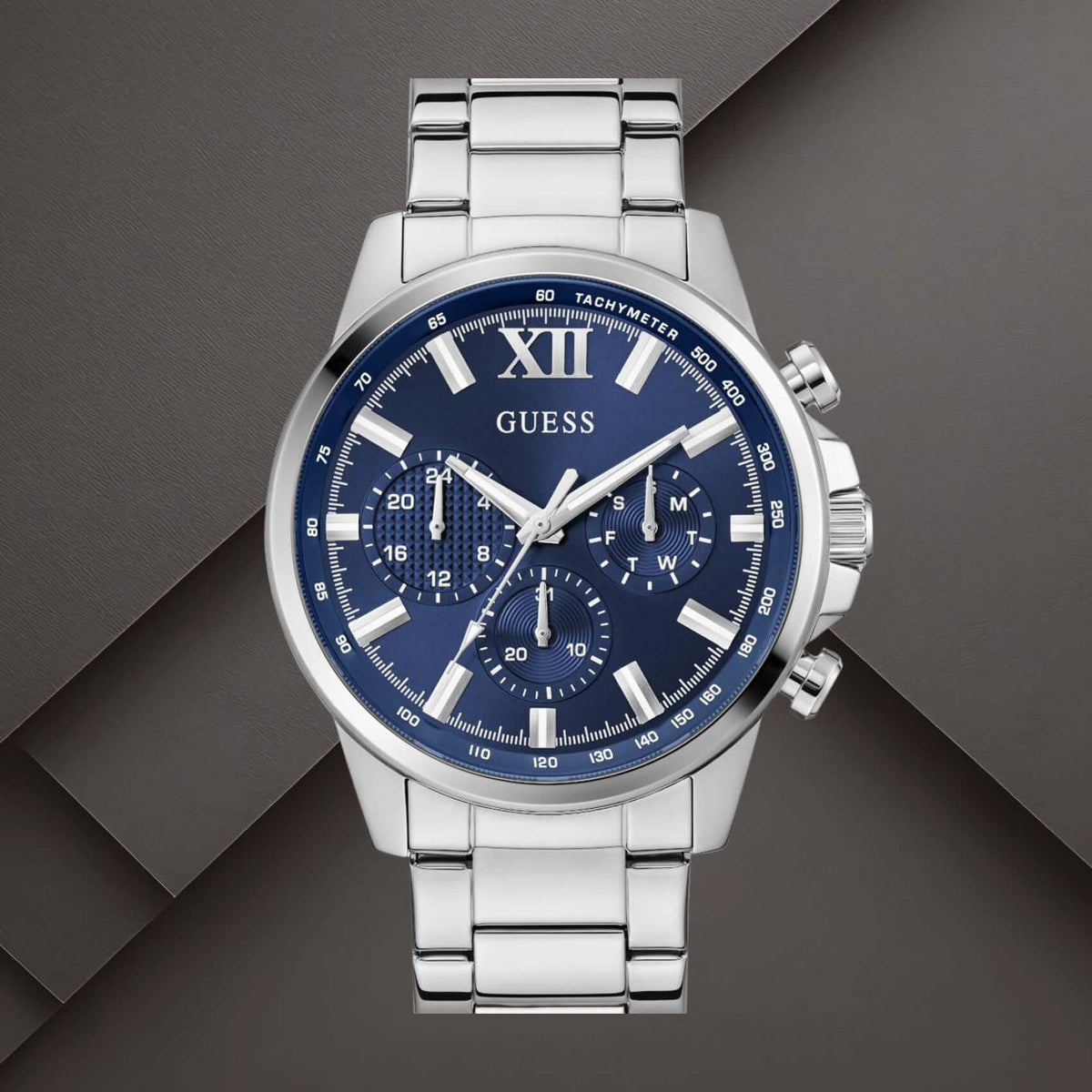 Guess GW0900G4 ανδρικό ρολόι με ασημί ατσάλινο μπρασελέ, μπλε καντράν διαμέτρου 44mm και ασημί λεπτομέρειες.