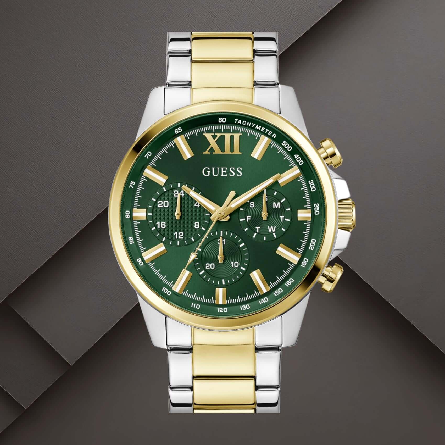 Guess GW0900G5 ανδρικό ρολόι με δίχρωμο ατσάλινο μπρασελέ σε ασημί και χρυσό χρώμα, πράσινο καντράν διαμέτρου 44mm και χρυσές λεπτομέρειες.