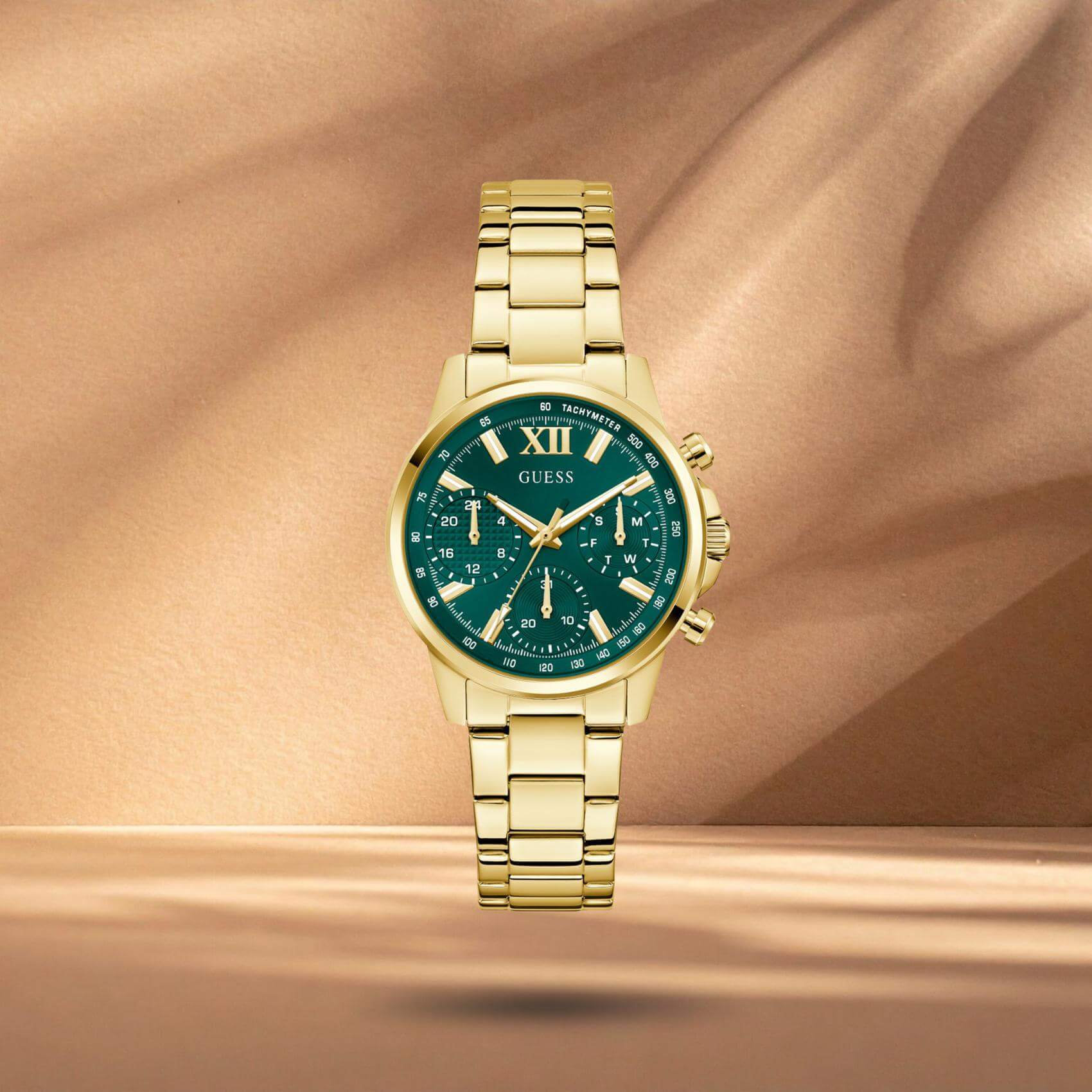 Guess GW0933L6 γυναικείο ρολόι με χρυσό ατσάλινο μπρασελέ, πράσινο καντράν διαμέτρου 36mm και χρυσές λεπτομέρειες.