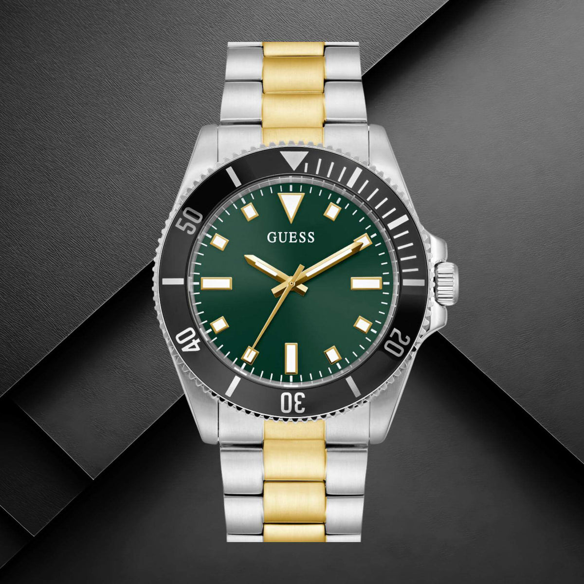 Guess GW0968G4 ανδρικό ρολόι με δίχρωμο ατσάλινο μπρασελέ σε ασημί και χρυσό χρώμα, πράσινο καντράν διαμέτρου 41mm και χρυσές λεπτομέρειες.
