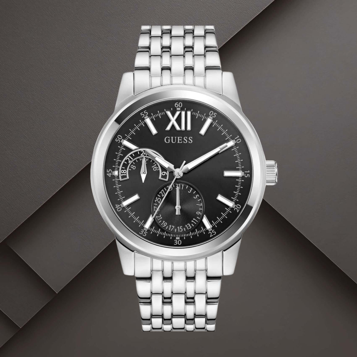 Guess GW0976G1 ανδρικό ρολόι με ασημί ατσάλινο μπρασελέ, μαύρο καντράν διαμέτρου 42mm και ασημί λεπτομέρειες.