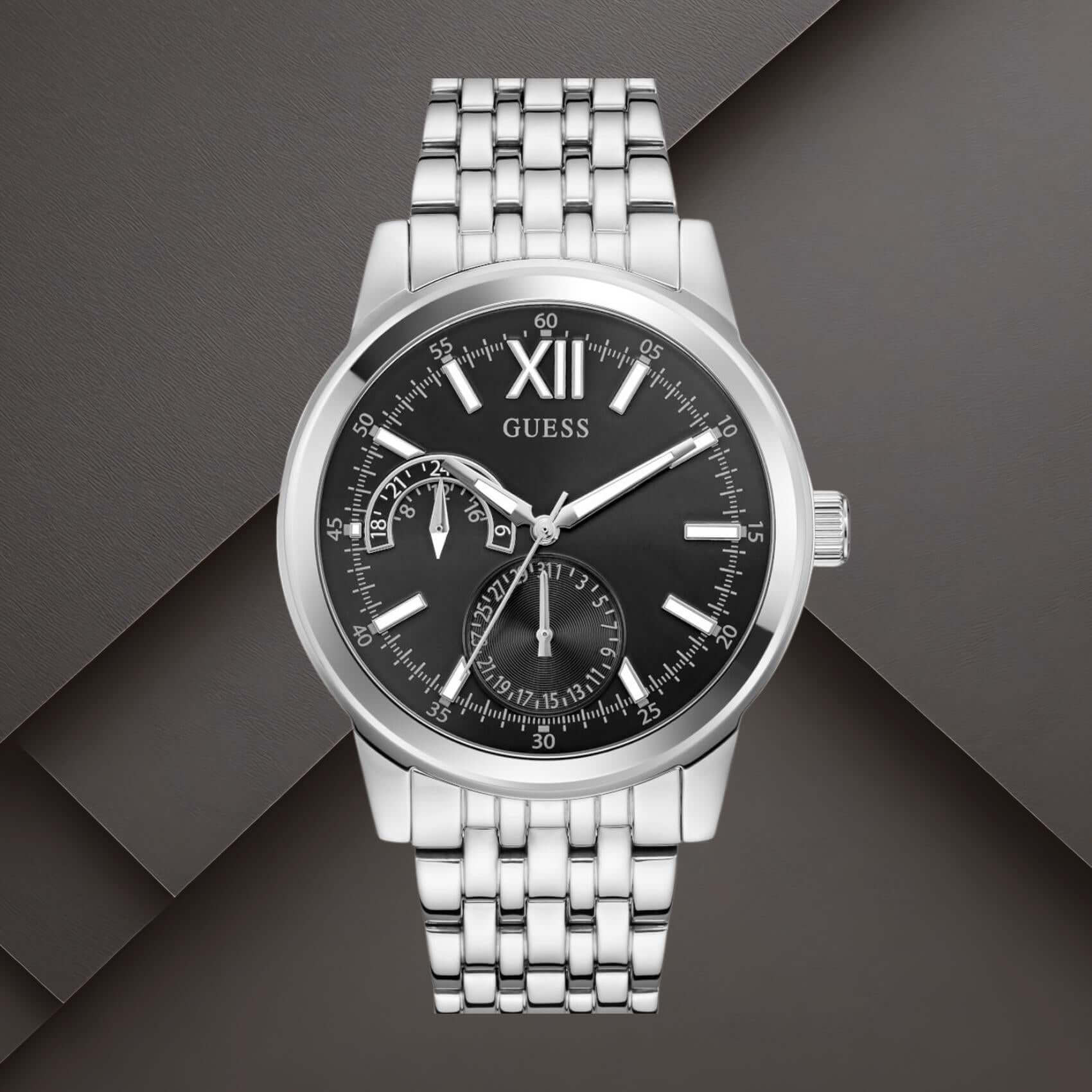 Guess GW0976G1 ανδρικό ρολόι με ασημί ατσάλινο μπρασελέ, μαύρο καντράν διαμέτρου 42mm και ασημί λεπτομέρειες.