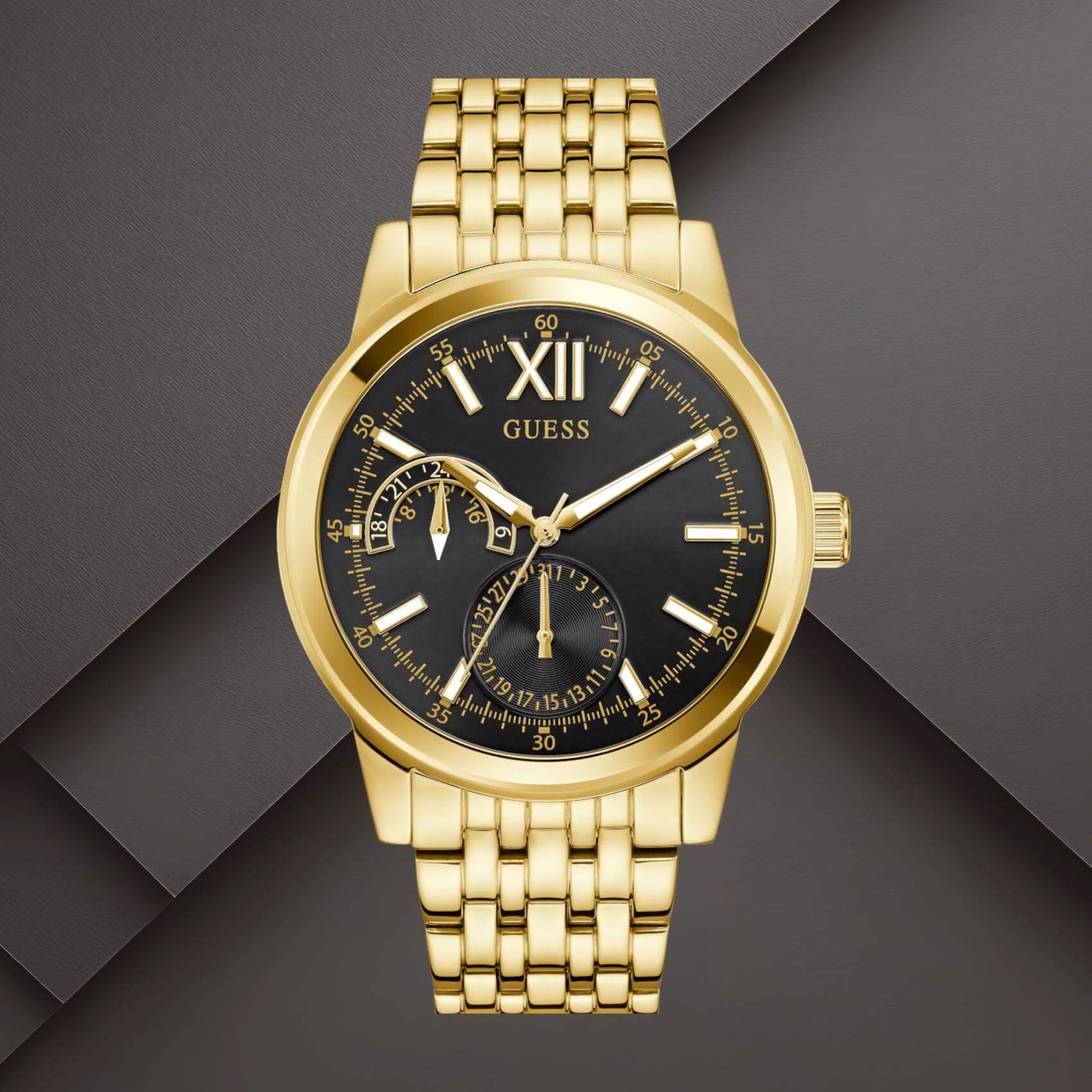 Guess GW0976G2 ανδρικό ρολόι με χρυσό ατσάλινο μπρασελέ, μαύρο καντράν διαμέτρου 42mm και χρυσές λεπτομέρειες.