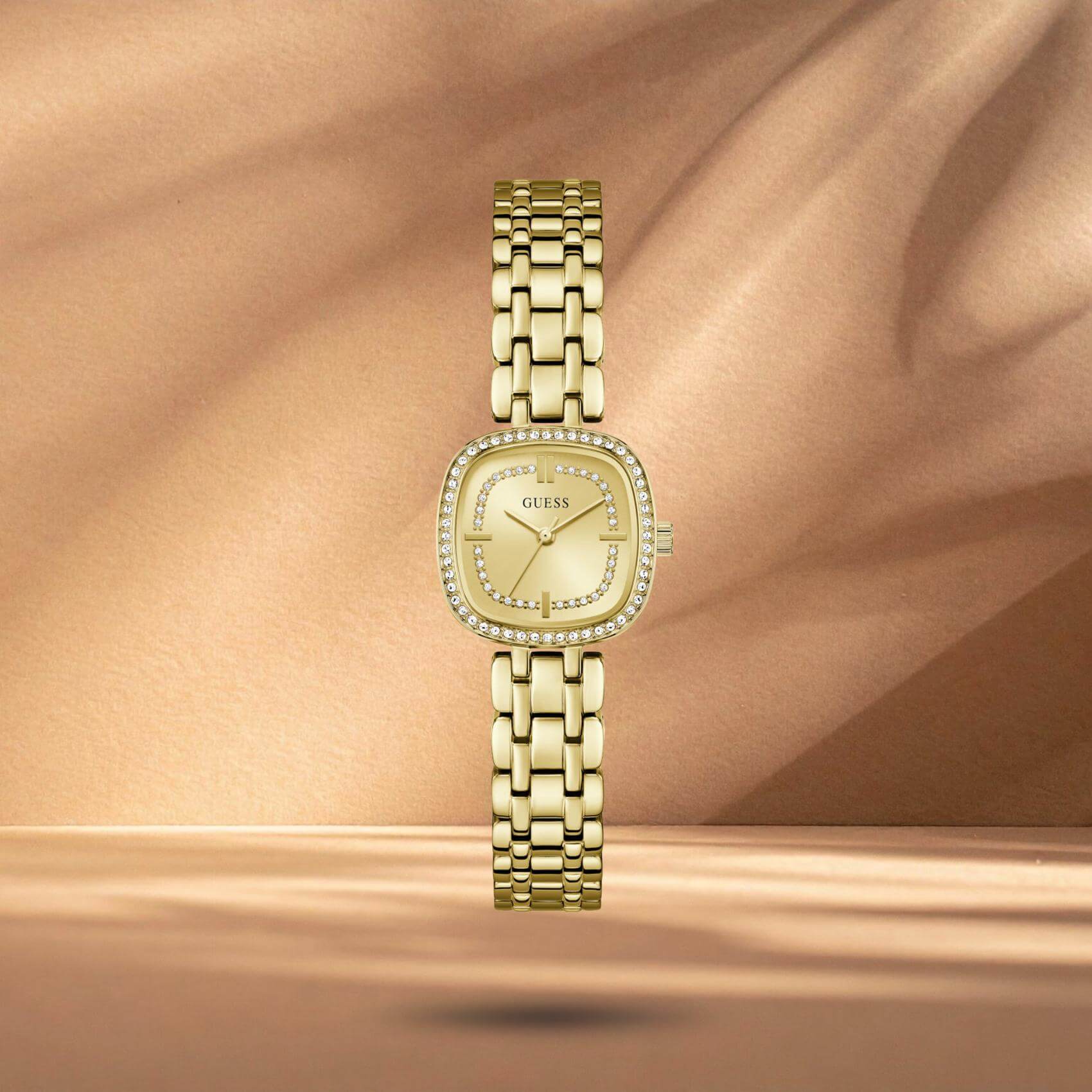 Guess Hazel GW1018L2 γυναικείο ρολόι με χρυσό μπρασελέ χρυσό καντράν 25mm και διακόσμηση με ζιργκόν.