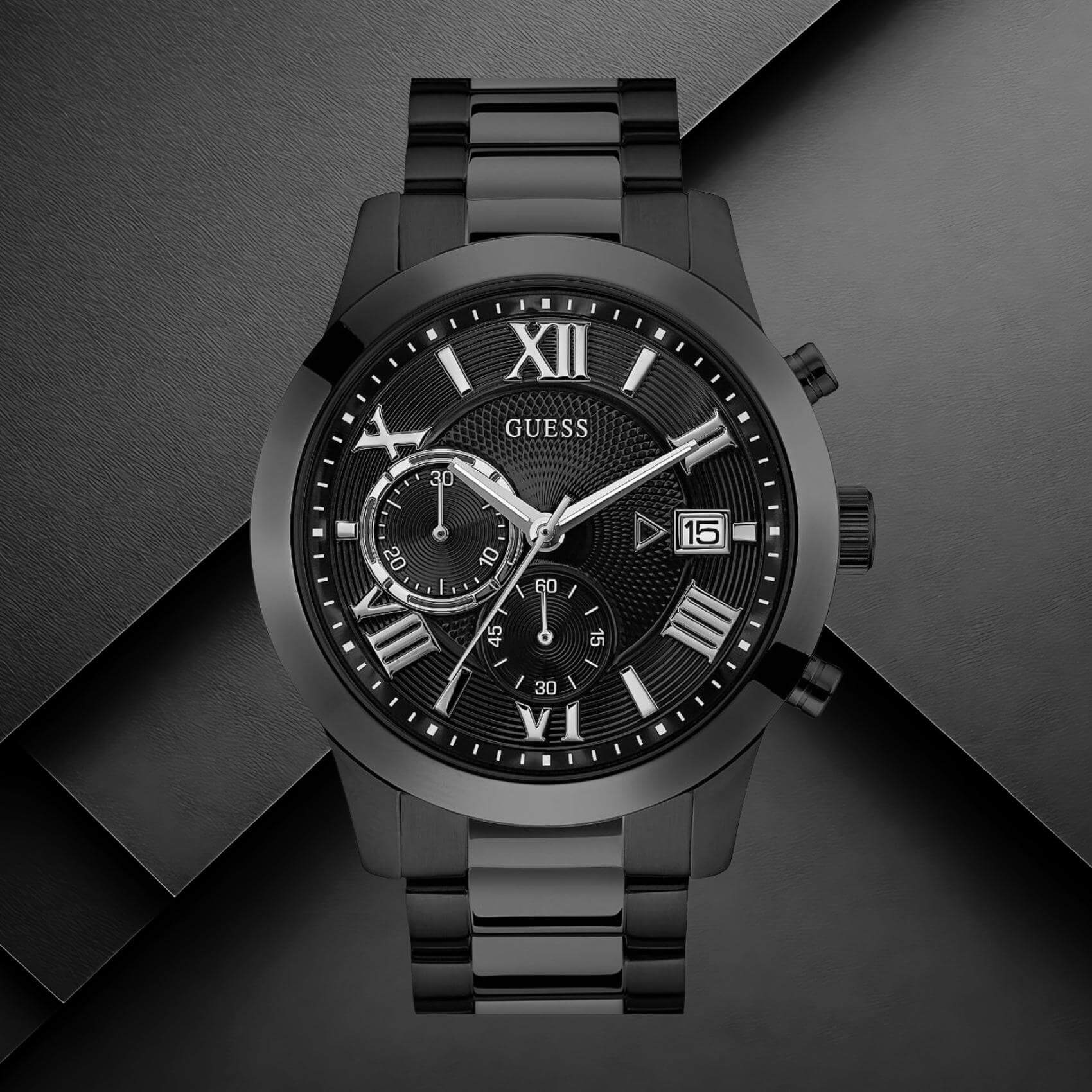 Guess W0668G5 ανδρικό ρολόι με μαύρο ατσάλινο μπρασελέ, μαύρο καντράν διαμέτρου 45mm και ασημί λεπτομέρειες.