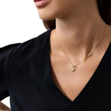 Γυναικείο κολιέ Emporio Armani Sentimental EG3622710 φορεμένο με κρεμαστό καρδιά και λευκά ζιργκόν σε χρυσό χρώμα.