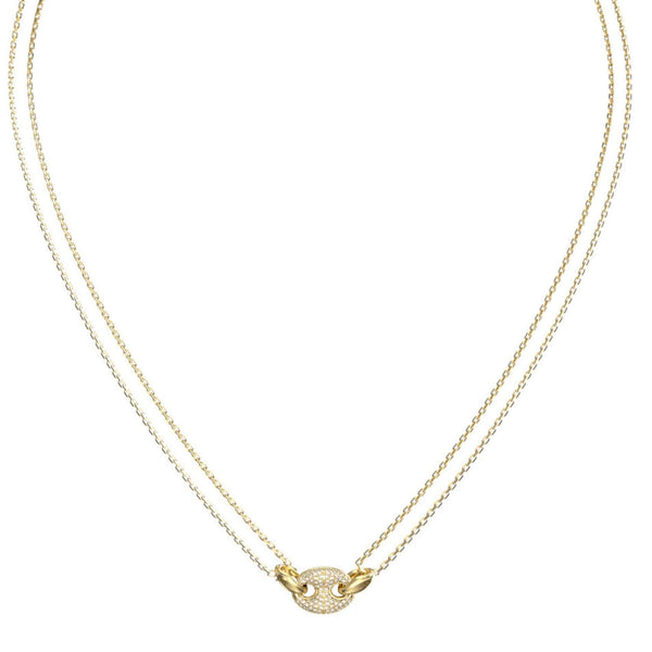Λεπτομέρεια από το γυναικείο κολιέ Guess JUBN06220JWYGT/U από ανοξείδωτο ατσάλι σε χρυσό χρώμα με διπλή αλυσίδα και ζιργκόν.