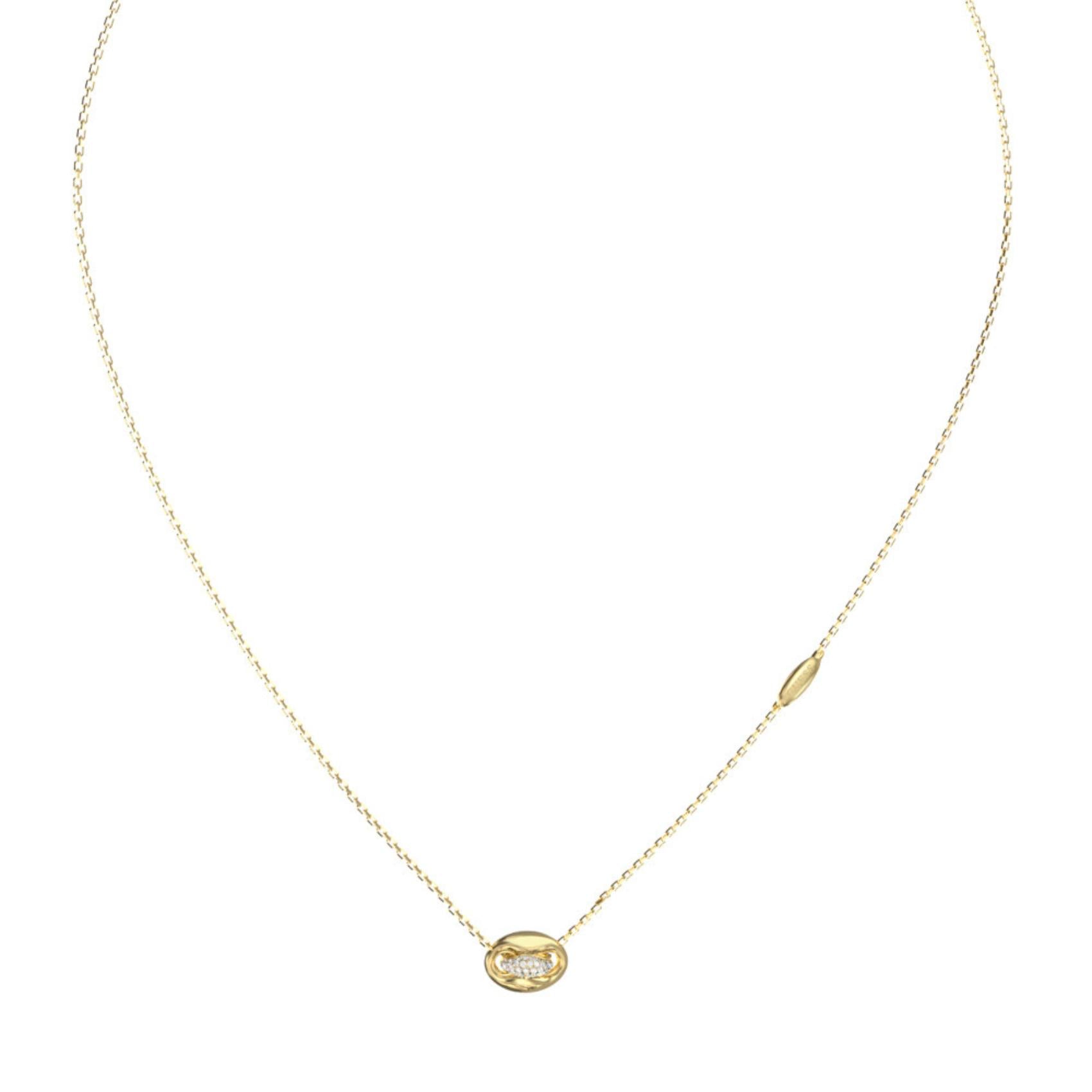 Λεπτομέρεια από το γυναικείο κολιέ Guess Marina JUBN06223JWYGT/U από ανοξείδωτο ατσάλι σε χρυσό χρώμα με ζιργκόν.