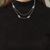 Aτσάλινο Γυναικείο Κολιέ Lacoste σε Ασημί με Διπλή Αλυσίδα 2040469, on model