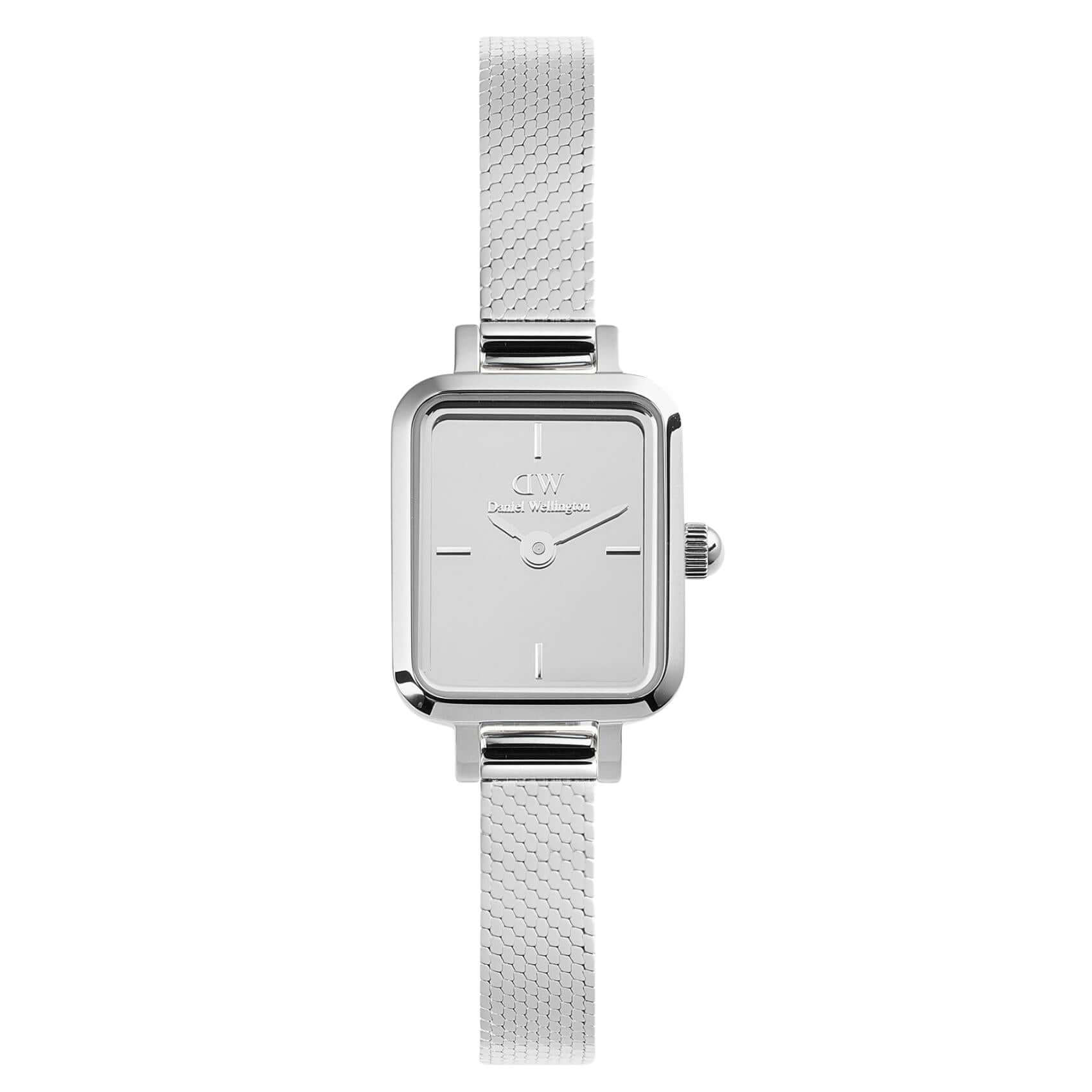 Γυναικείο ρολόι Daniel Wellington Quadro Mini Reflection DW00100800 με ασημί ατσάλινο μπρασελέ και ασημί τετράγωνο καντράν μεγέθους 15.4x18.2mm.