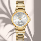 Φωτογραφία του γυναικείου ρολογιού  JCOU Aurelia JU19078-3 με χρυσό μπρασελέ και ασημί καντράν, μπροστινή όψη.