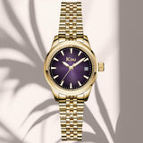 Φωτογραφία του γυναικείου ρολογιού JCOU Calisti JU19079-6 με χρυσό μπρασελέ και μωβ καντράν,  ένδειξη ημερομηνίας