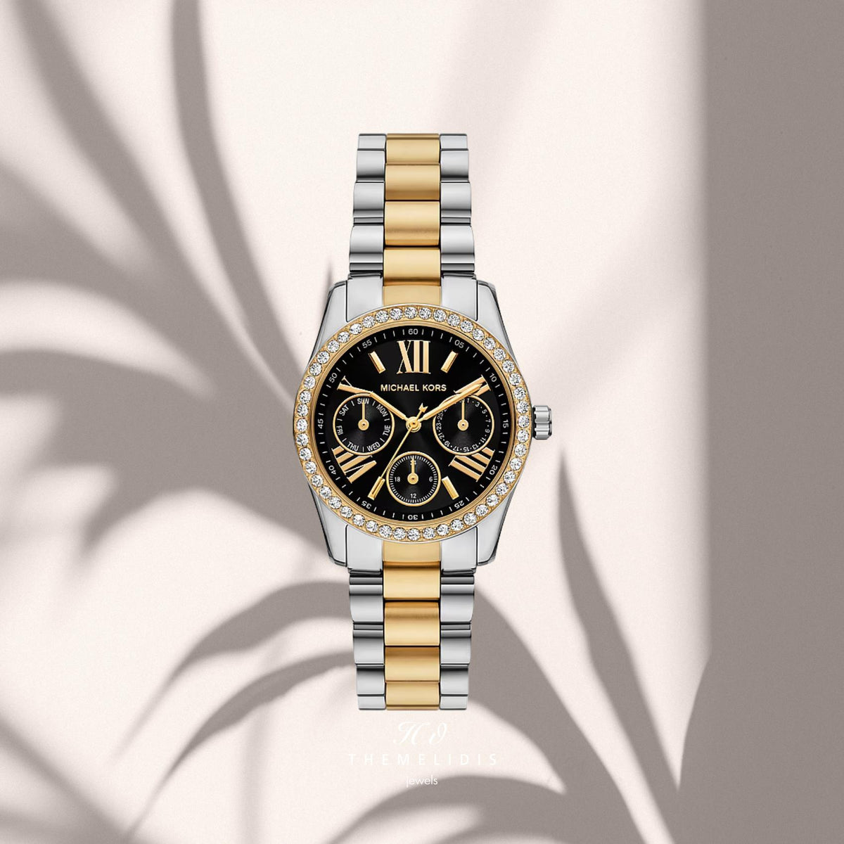 Γυναικείο ρολόι Michael Kors Lexington MK4925 με ασημί-χρυσό μπρασελέ, μαύρο καντράν 33mm, ενδείξεις ημέρας και ημερομηνίας