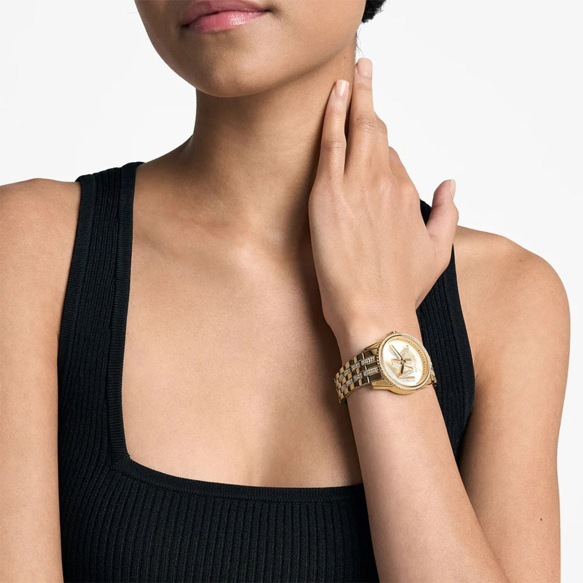 Γυναικείο ρολόι Michael Kors Mini Ritz MK7540 με χρυσό μπρασελέ και χρυσό καντράν φορεμένο στον καρπό