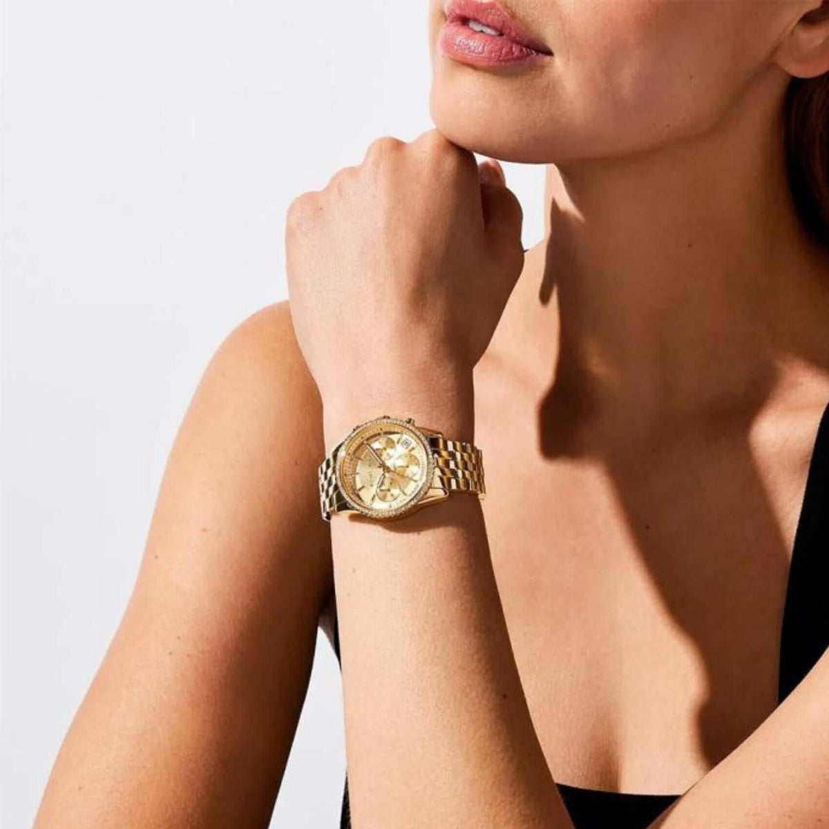 Γυναικείο ρολόι Michael Kors Ritz MK7530 χρονογράφος με χρυσό ατσάλινο μπρασελέ, χρυσό κάντραν 34mm με ζιργκόν και ημερομηνία-φορεμένο.