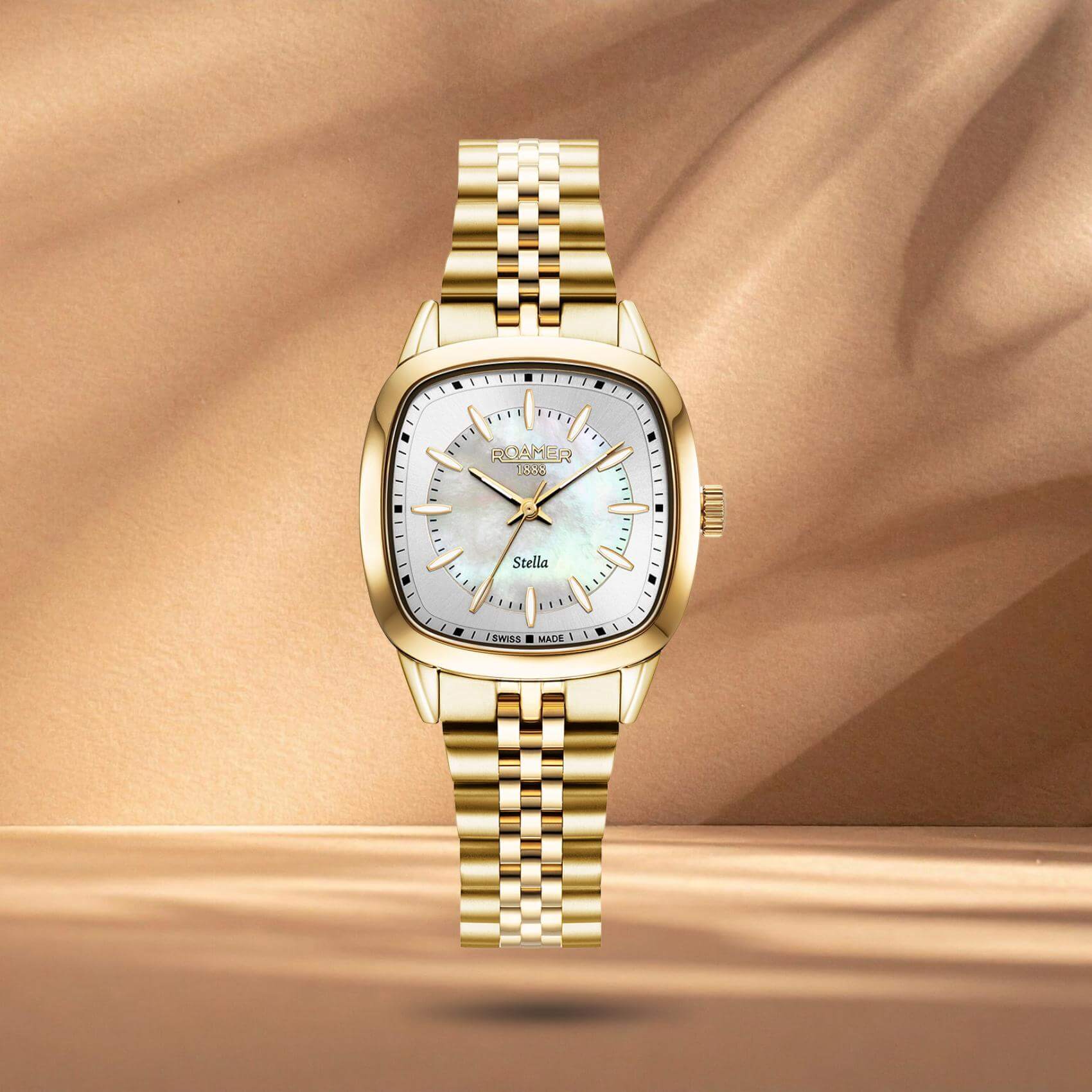 Γυναικείο ρολόι Roamer Stella 966847-48-20-20 με χρυσό μπρασελέ από ανοξείδωτο ατσάλι και ασημί καντράν από φίλντισι διαμέτρου 32mm.