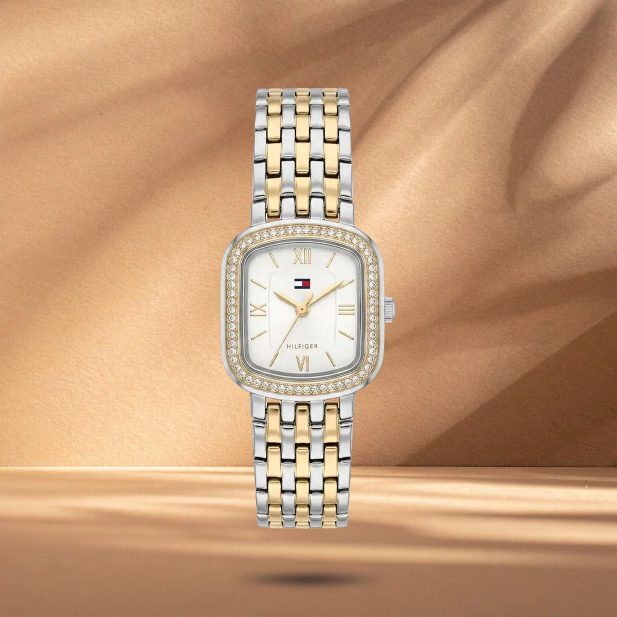 Γυναικείο ρολόι Tommy Hilfiger Abby 1782922 με ασημί-χρυσό μπρασελέ, ασημί τετράγωνο καντράν 22x22mm με ζιργκόν