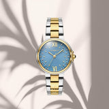Γυναικείο ρολόι Vogue Carmen Mini 2020616062 με γαλάζιο καντράν και δίχρωμο ατσάλινο μπρασελέ σε ασημί και χρυσό χρώμα.