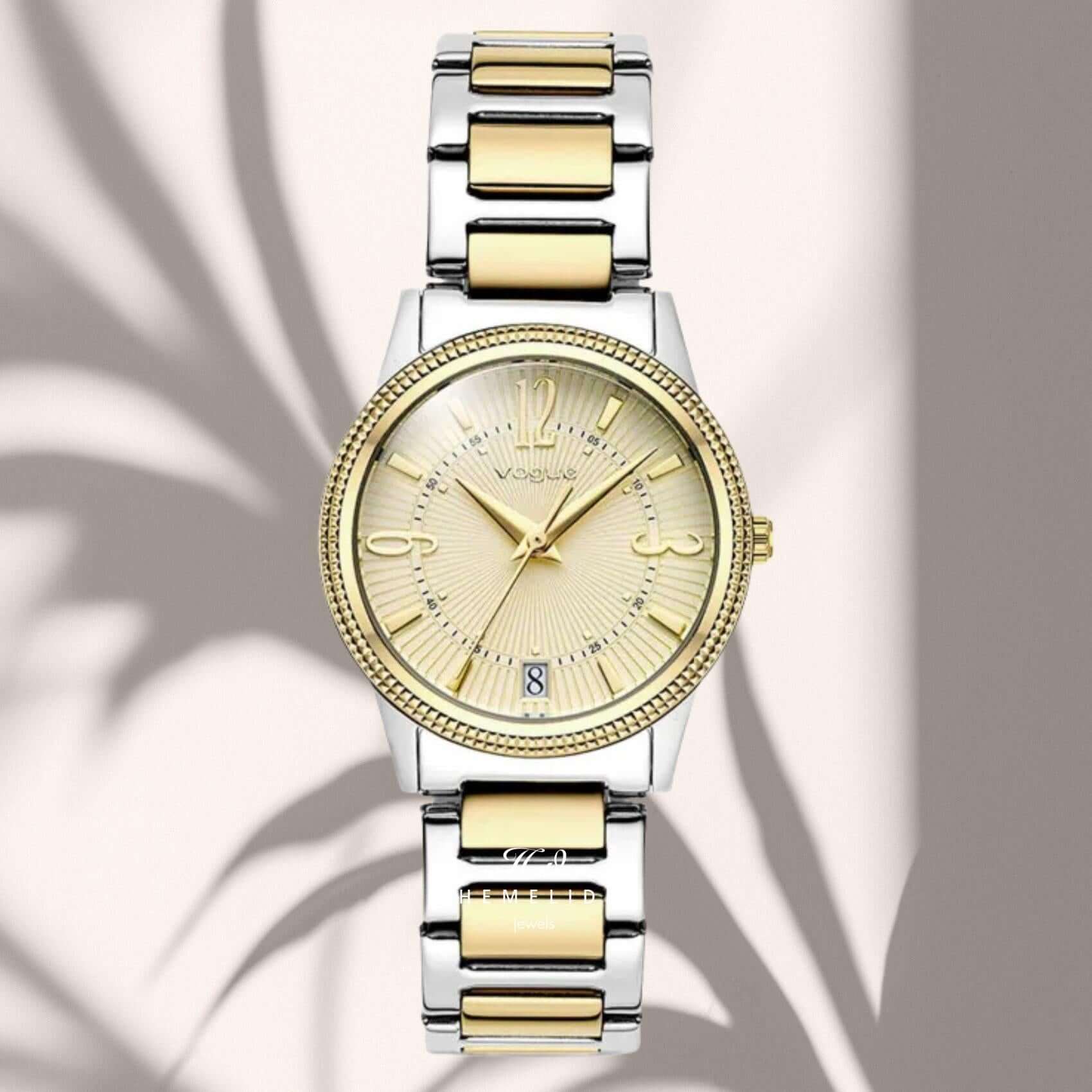 Φωτογραφία του γυναικείου ρολογιού Vogue Corine 2020615762 με δίχρωμο μπρασελέ και σαμπανί καντράν, αναδεικνύοντας την κομψή και σύγχρονη αισθητική του