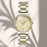 Φωτογραφία του γυναικείου ρολογιού Vogue Corine 2020615762 με δίχρωμο μπρασελέ και σαμπανί καντράν, αναδεικνύοντας την κομψή και σύγχρονη αισθητική του