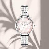 Γυναικείο ρολόι Vogue New Bliss 2020616383 με ροζ φίλντισι καντράν  διαμέτρου 32mm και ασημί ατσάλινο μπρασελέ.