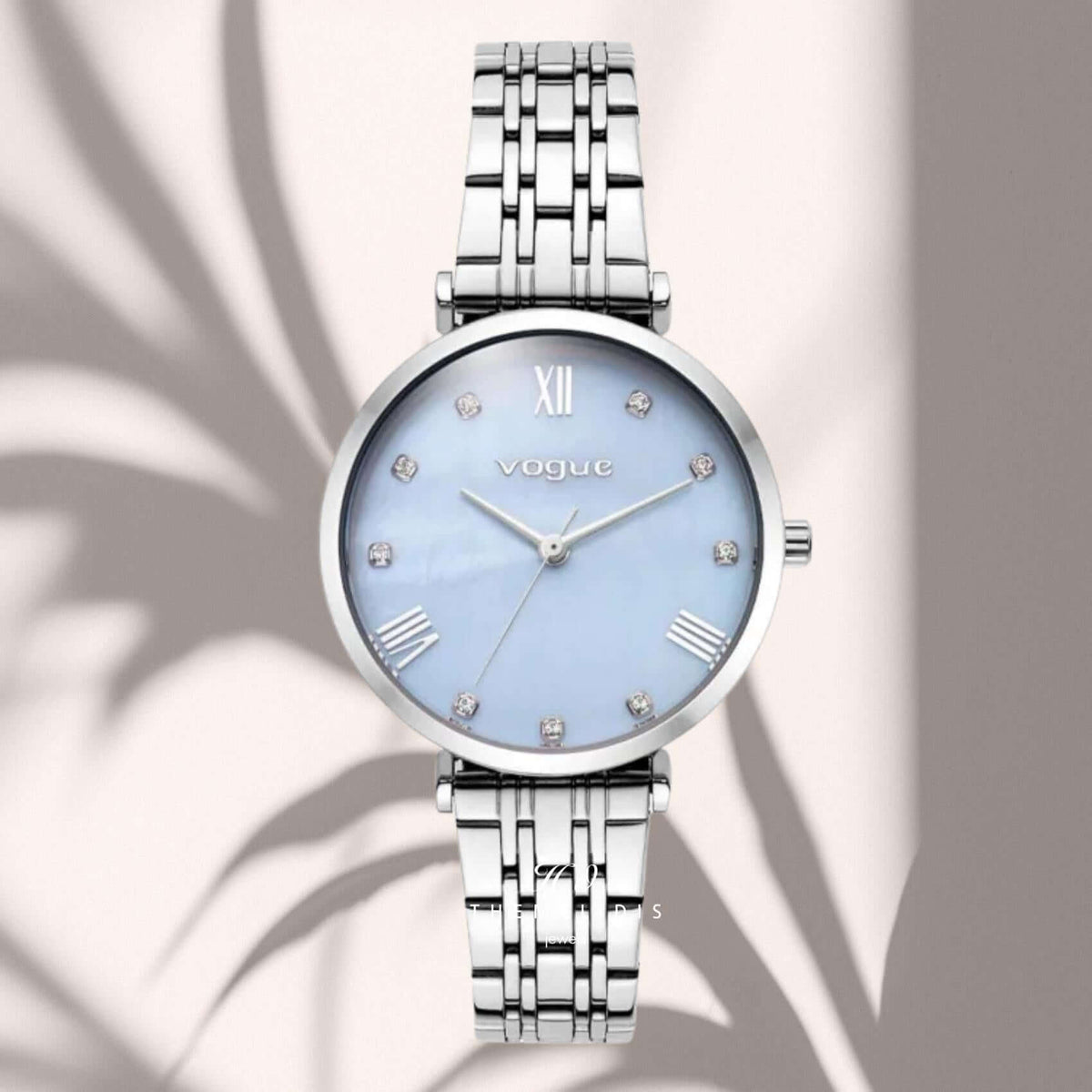 Γυναικείο ρολόι Vogue New Bliss 2020616384 με γαλάζιο φίλντισι καντράν 32mm και ασημί ατσάλινο μπρασελέ.