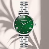 Φωτογραφία του γυναικείου ρολογιού Vogue New Bliss 2020616385 με ασημί μπρασελέ από ανοξείδωτο ατσάλι, πράσινο φίλντισι καντράν με ζιργκόν και κάσα διαμέτρου 32mm