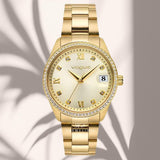 Φωτογραφία του γυναικείου ρολογιού ρολόι Vogue Reina 2020614144 με χρυσό μπρασελέ και χρυσό καντράν, αναδεικνύοντας τον εντυπωσιακό και λαμπερό σχεδιασμό του 