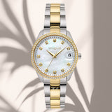 Φωτογραφοία του γυναικείου ρολογιού Vogue Reina Mini 2020614364 με δίχρωμο χρυσό–ασημί μπρασελέ και λευκό φίλντισι καντράν, αναδεικνύοντας τον κομψό και λαμπερό χαρακτήρα του