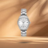 Γυναικείο ρολόι Vogue Reina Mini 2020614386 με ασημί καντράν 27mm και ασημί ατσάλινο μπρασελέ με ένδειξη ημερομηνίας.