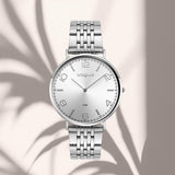 Vogue Unique 2020650681 ασημί μπρασελέ και ασημί καντράν.