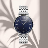 Vogue Unique 2020650684 ασημί μπρασελέ και μπλε καντράν.